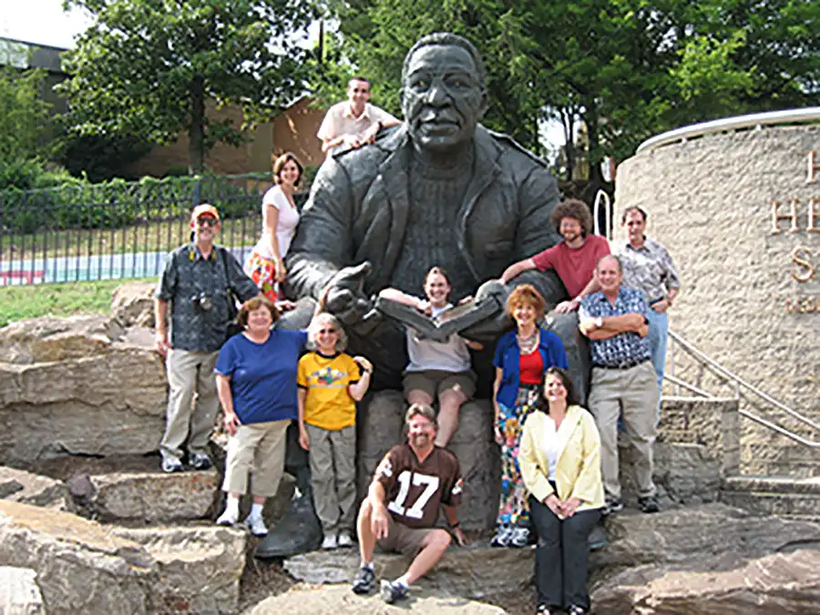 Participants from the 2004 NEH Teacher Summer Institute on the Geography of the American South pose at the Alex Haley statue in Knoxville.